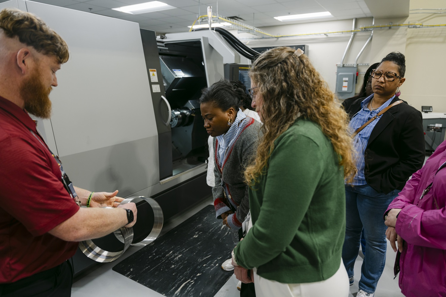 Educators tour training center, explore defense missions at SRS