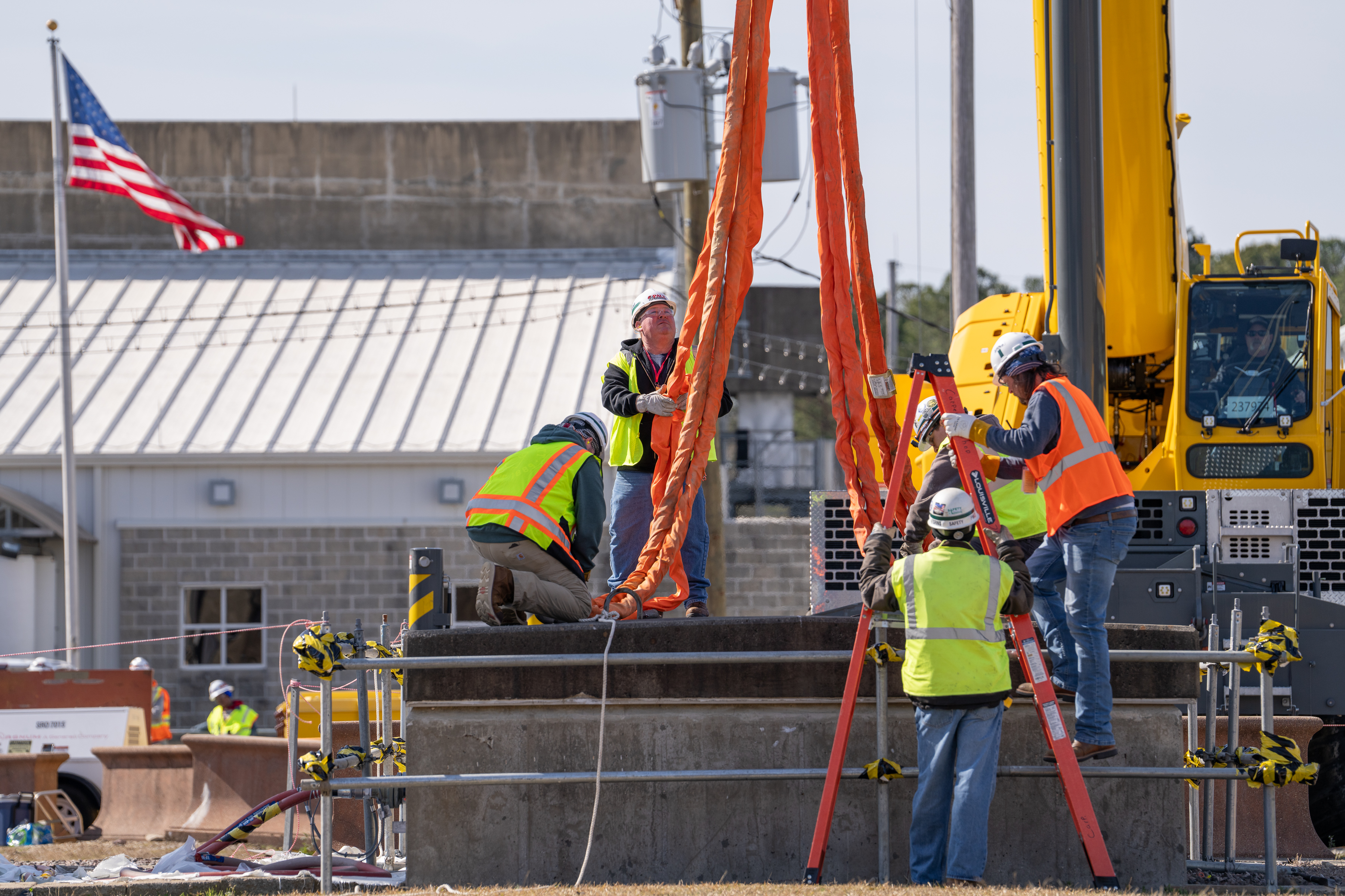 Personnel installed the appropriate rigging needed to lift the 41,000-pound hatch.