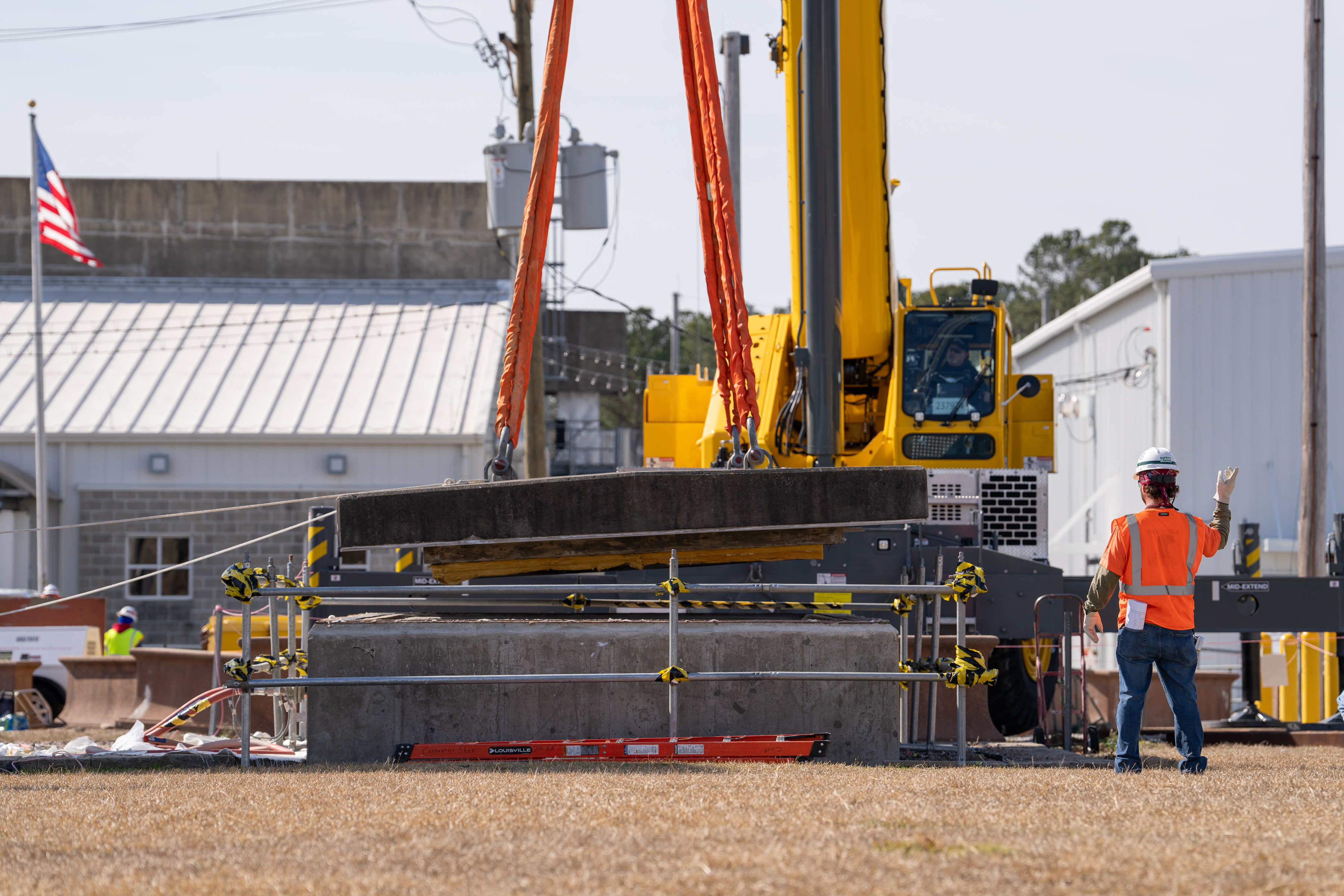 A 165-ton crane was used to remove the 42,000 -pound hatch that served as an entry for larger equipment incapable of fitting through the normal facility access points.