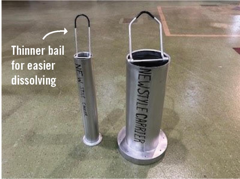 The new-style High Flux Isotope Reactor spent nuclear fuel carriers have a slightly thinner bail made of a more easily dissolvable alloy than the previous bail.