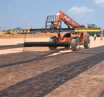 Workers install the geosynthetic cap at the old Radioactive Waste Burial Ground