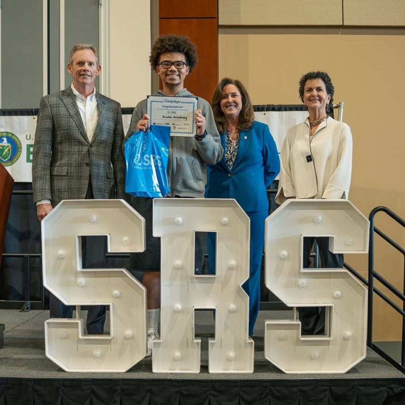 North Augusta High School senior Quinton Armstrong accepts a ,000 scholarship presented by Jim Dawkins, Executive Vice President and Chief Operations Officer; Dawn Haygood, SRNS Director, Office of the President and Corporate Communications; and Barbara Smoak, Deputy Director of Corporate Communications
at this year’s CSRA College Night.