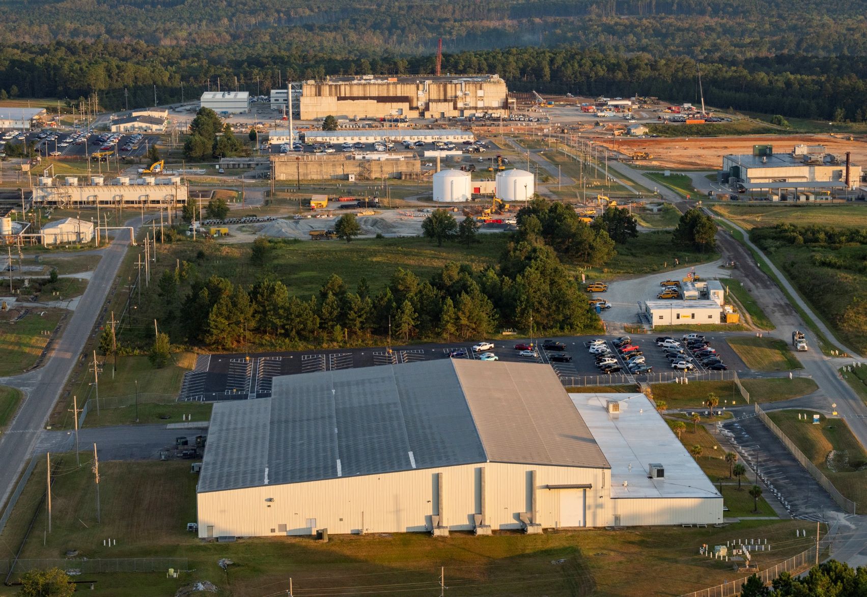 The existing 103,000-square-foot High-Fidelity Training and Operations Center (HFTOC), foreground, is pictured with the 400,000-square-foot Savannah River Plutonium Processing Facility (SRPPF), background, at the Savannah River Site.